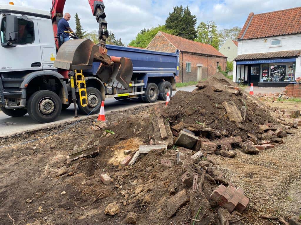 This is a photo of a dig out being carried out for the installation of a new tarmac driveway. Works being carried out by Loddon Driveways