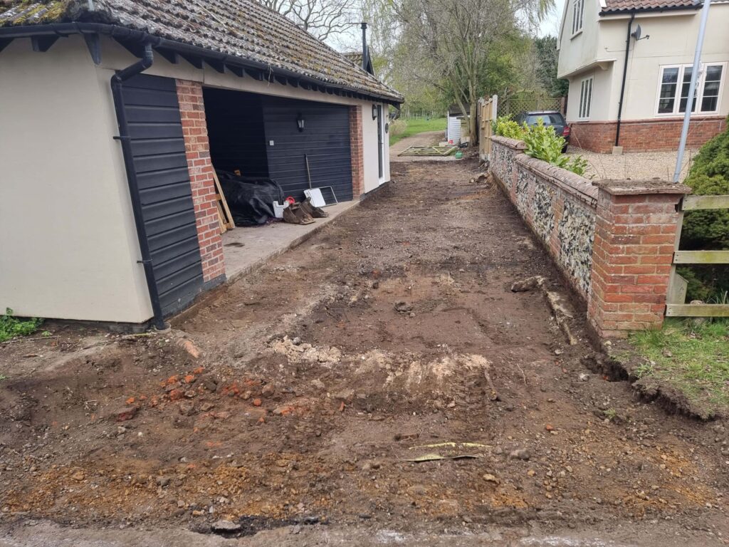 This is a tarmac driveway that is in the process of being dug out and installed by Loddon Driveways & Surfacing